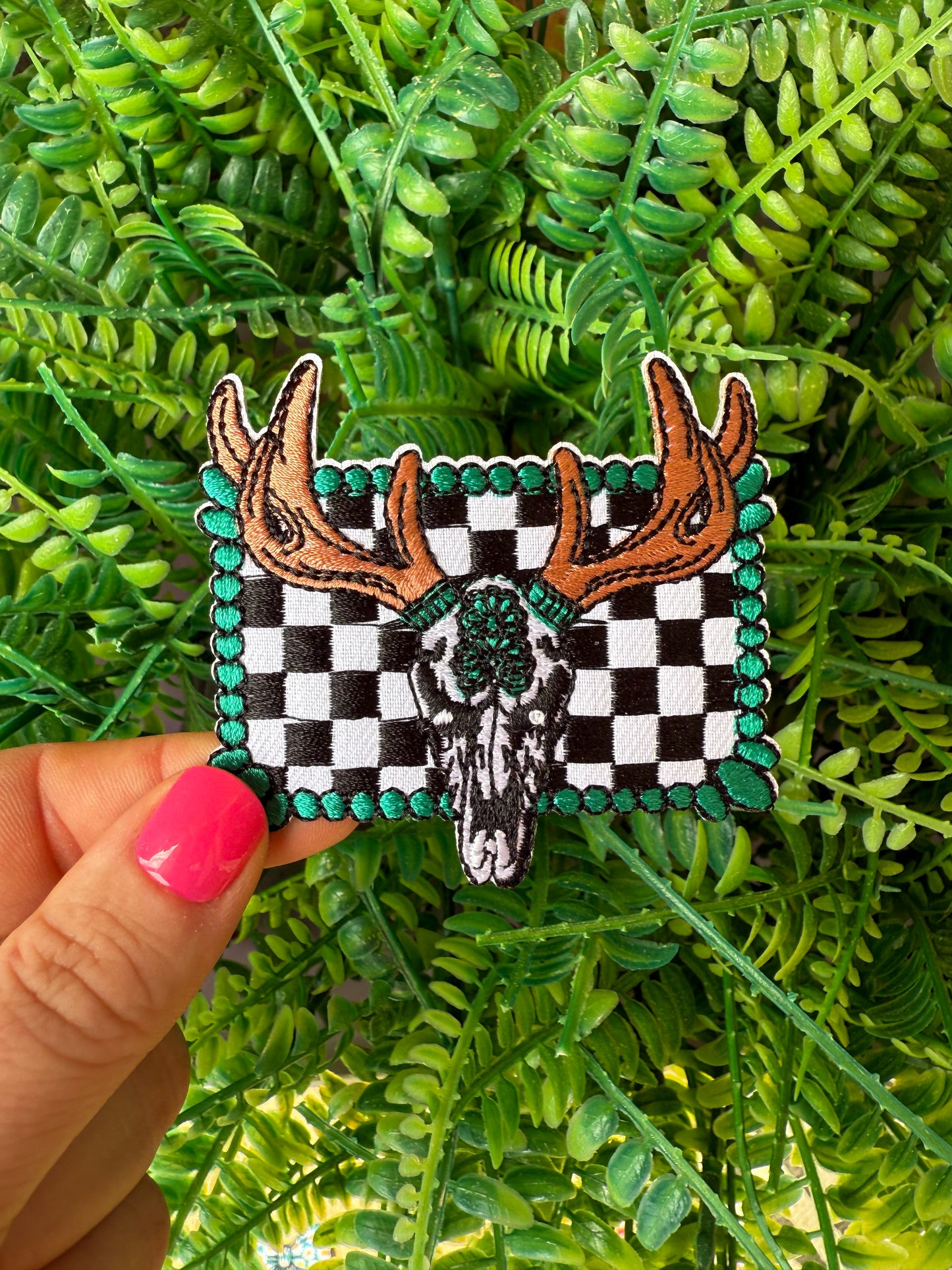 Western cowskull turquoise checkered iron on patch