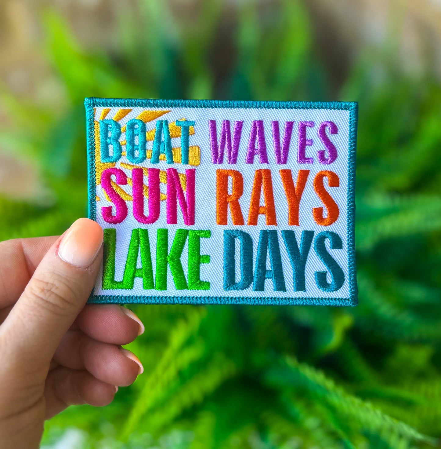 Boat waves sun rays lake days embroidered iron on trucker hat patch