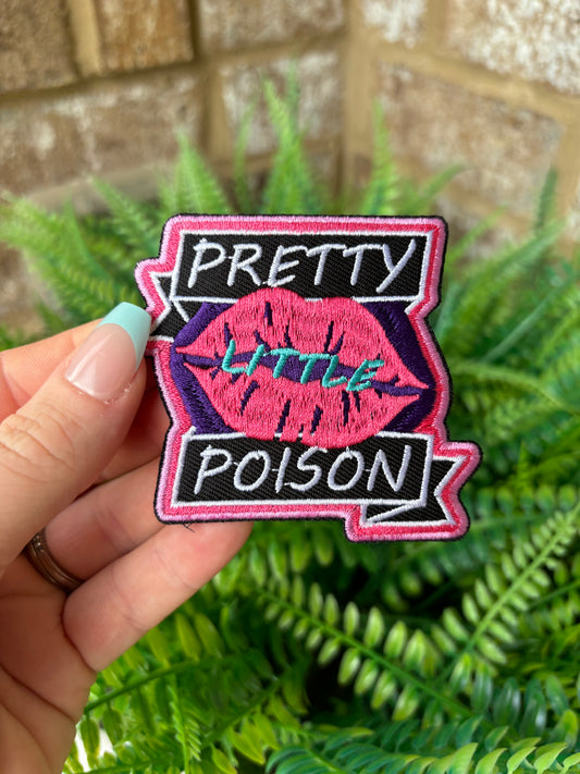 Pretty little poison embroidered iron on patch