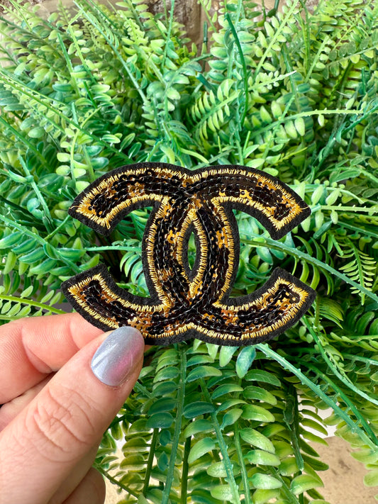 Black and gold sequin CC bling iron on trucker hat patch